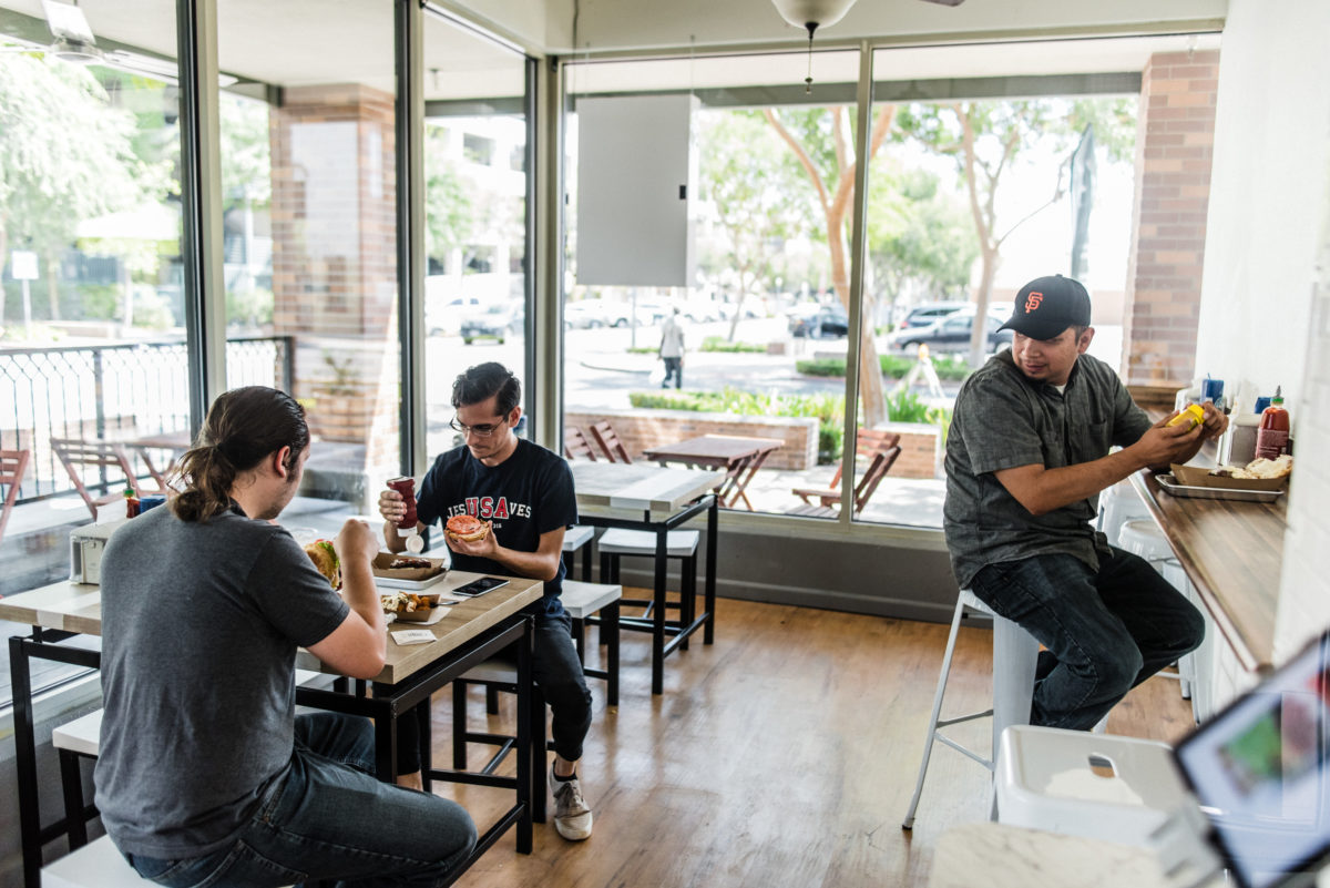 Vinson eats lunch with two co-workers